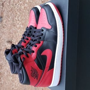 Used pair men shoes size 10.5 Jordan 1 mid colorway black,gym red-white